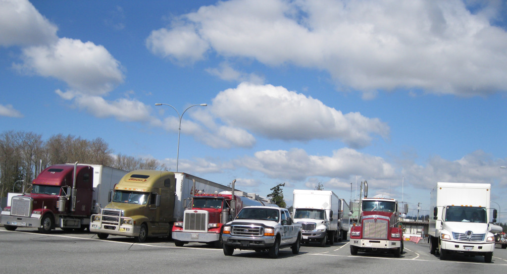 Trucks waiting at Pacific Highway light.